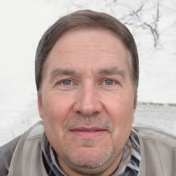 Joyful white adult male with short  brown hair and grey eyes