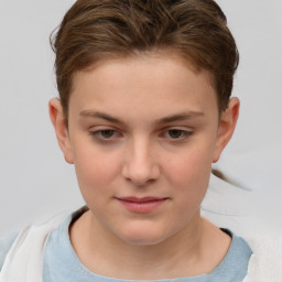 Joyful white child female with short  brown hair and brown eyes