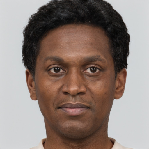 Neutral black young-adult male with short  brown hair and brown eyes