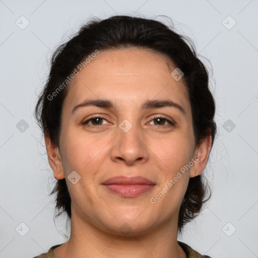 Joyful white adult female with medium  brown hair and brown eyes