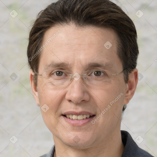 Joyful white adult male with short  brown hair and grey eyes