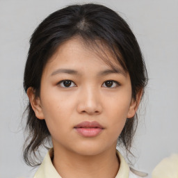 Neutral asian young-adult female with medium  brown hair and brown eyes