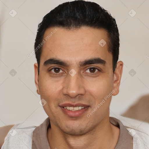 Joyful white young-adult male with short  black hair and brown eyes