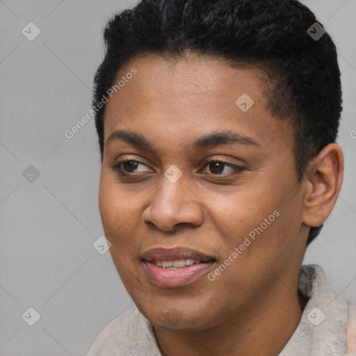 Joyful black young-adult female with short  black hair and brown eyes