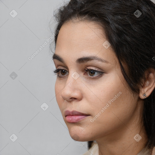 Neutral white young-adult female with long  brown hair and brown eyes