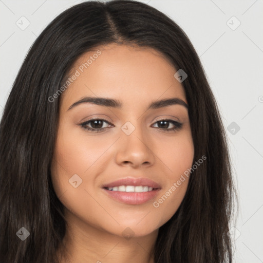 Joyful latino young-adult female with long  brown hair and brown eyes