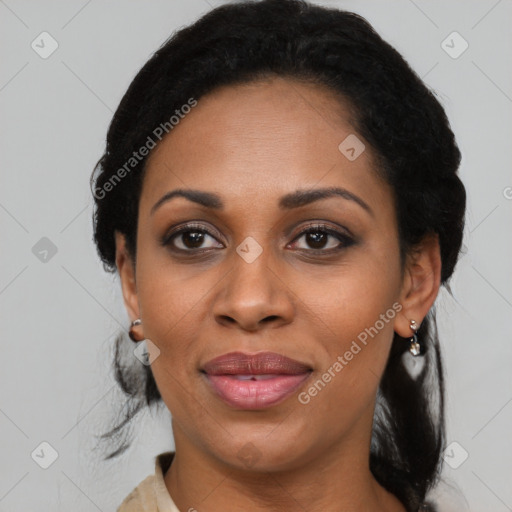 Joyful black adult female with medium  black hair and brown eyes