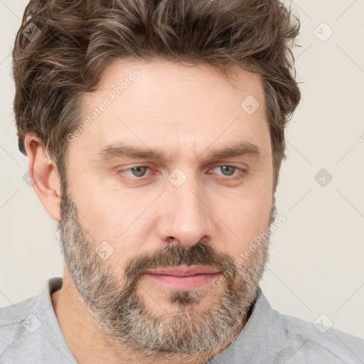 Neutral white adult male with short  brown hair and brown eyes