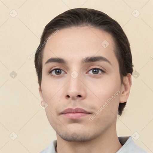 Neutral white young-adult male with short  brown hair and brown eyes