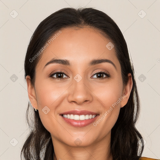 Joyful white young-adult female with long  brown hair and brown eyes