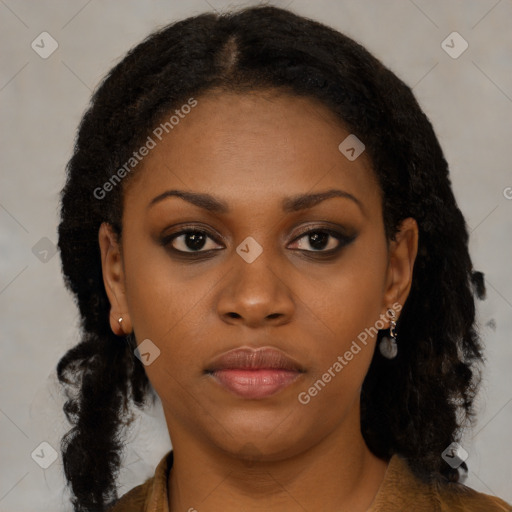 Neutral black young-adult female with medium  black hair and brown eyes