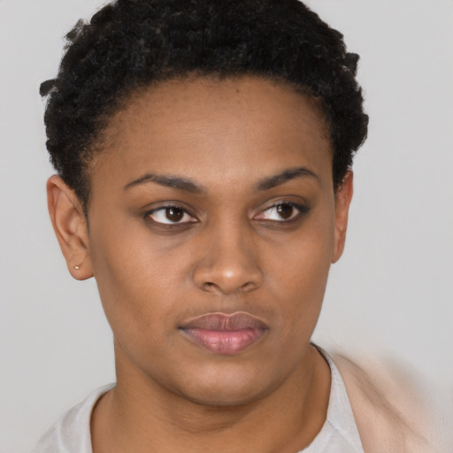 Neutral black young-adult female with short  brown hair and brown eyes