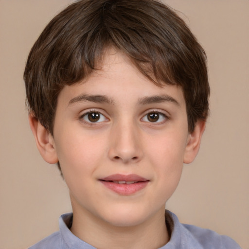 Joyful white child male with short  brown hair and brown eyes