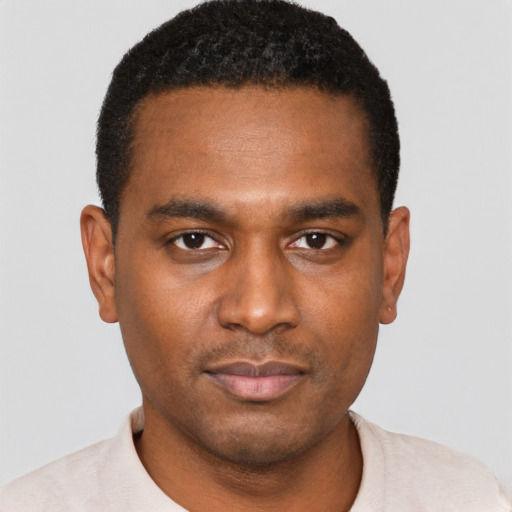 Neutral black young-adult male with short  black hair and brown eyes