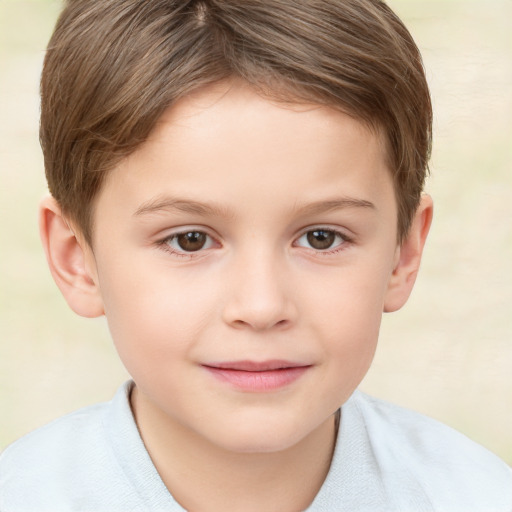 Joyful white child male with short  brown hair and brown eyes