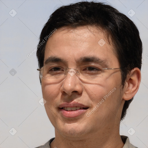 Joyful white adult male with short  brown hair and brown eyes