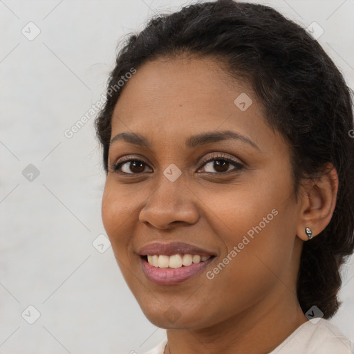 Joyful latino young-adult female with medium  brown hair and brown eyes