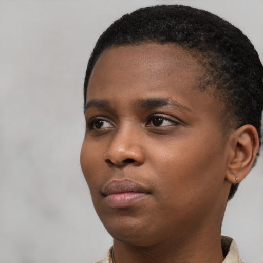 Neutral black young-adult female with short  black hair and brown eyes