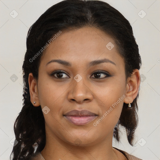 Joyful black young-adult female with medium  brown hair and brown eyes