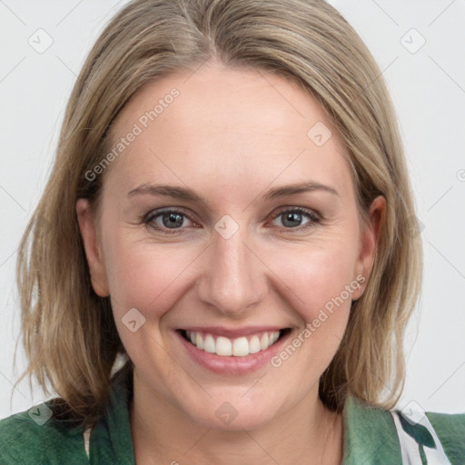 Joyful white young-adult female with medium  brown hair and blue eyes