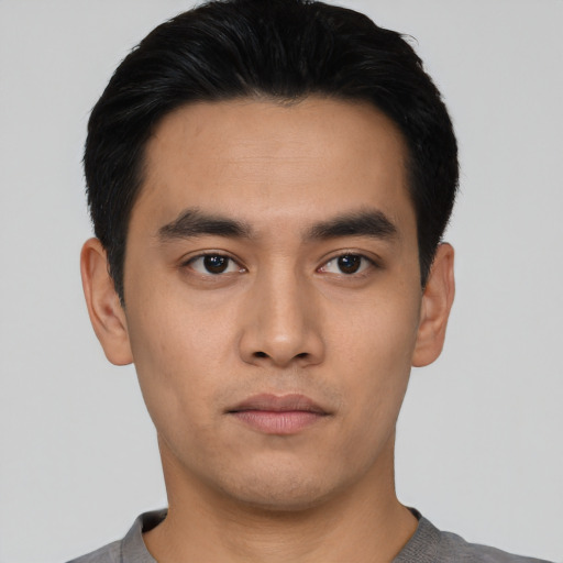 Neutral asian young-adult male with short  black hair and brown eyes