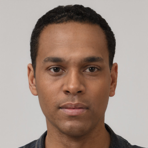 Neutral black young-adult male with short  black hair and brown eyes