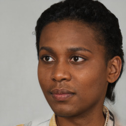 Neutral black young-adult female with short  brown hair and brown eyes