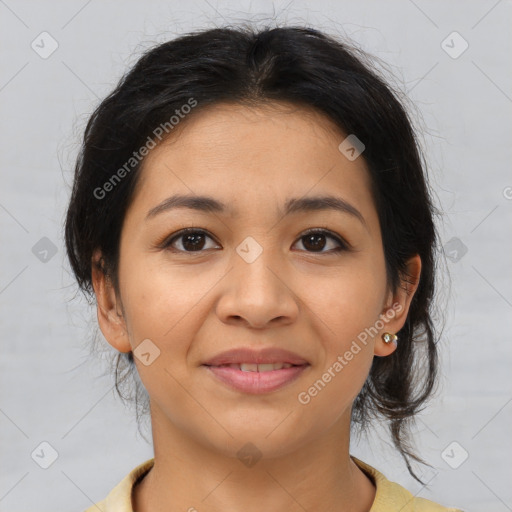 Joyful latino young-adult female with medium  brown hair and brown eyes