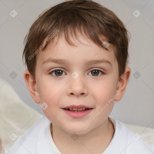 Joyful white child male with short  brown hair and brown eyes