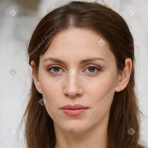 Neutral white young-adult female with long  brown hair and brown eyes