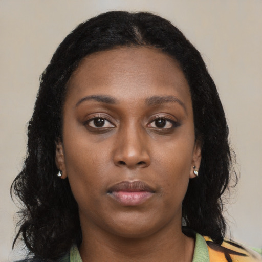 Neutral black young-adult female with long  black hair and brown eyes