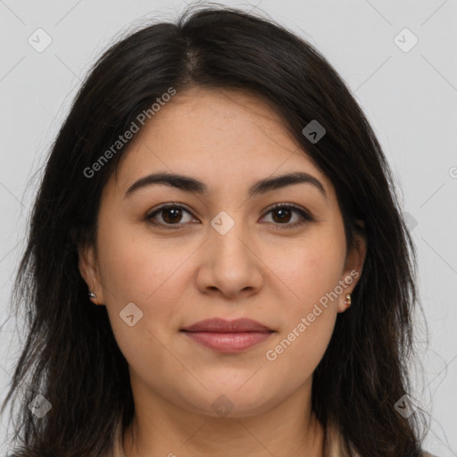 Joyful latino young-adult female with long  brown hair and brown eyes