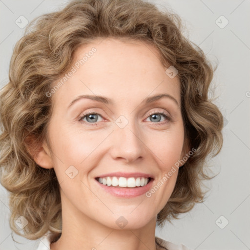 Joyful white young-adult female with medium  brown hair and green eyes