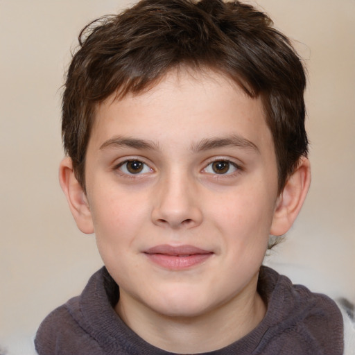 Joyful white child male with short  brown hair and brown eyes