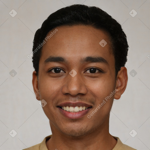 Joyful latino young-adult male with short  black hair and brown eyes