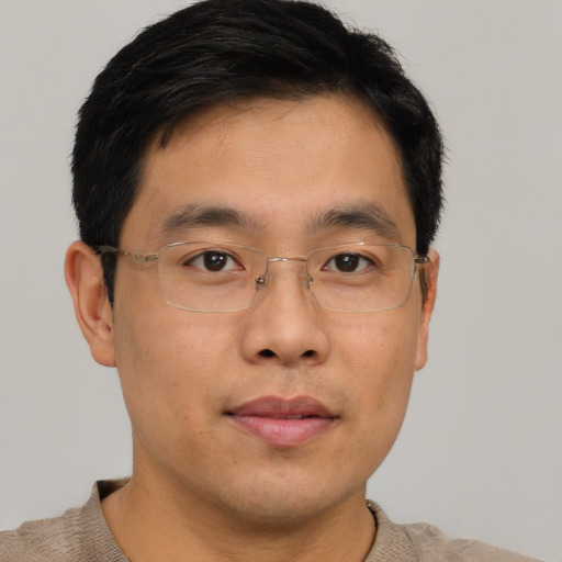 Neutral asian young-adult male with short  brown hair and brown eyes