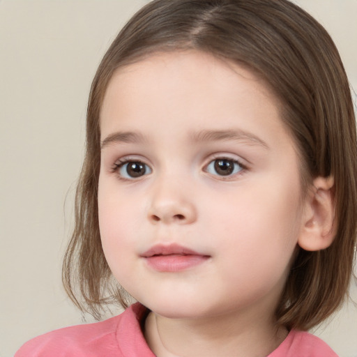 Neutral white child female with medium  brown hair and brown eyes