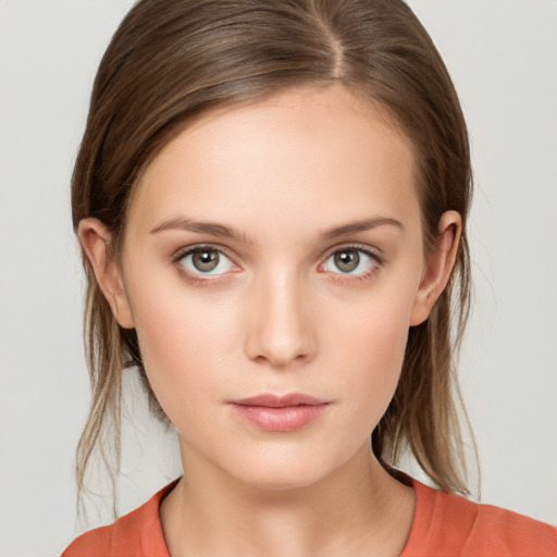 Neutral white young-adult female with medium  brown hair and brown eyes