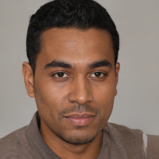 Neutral black young-adult male with short  black hair and brown eyes