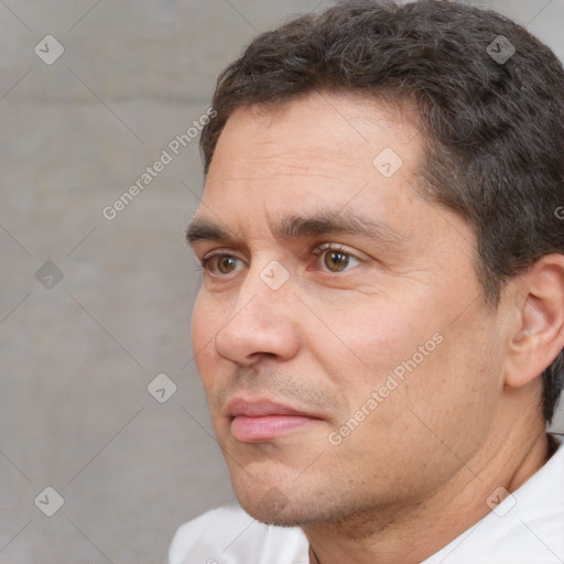 Neutral white adult male with short  brown hair and brown eyes