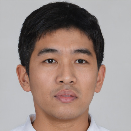 Neutral asian young-adult male with short  black hair and brown eyes
