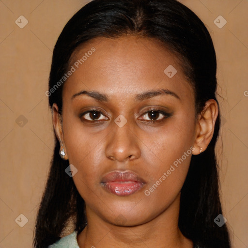 Neutral black young-adult female with long  brown hair and brown eyes