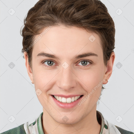 Joyful white young-adult female with short  brown hair and grey eyes