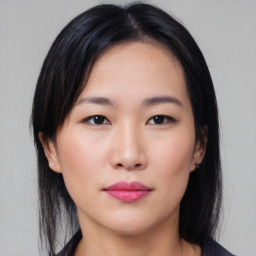 Neutral asian young-adult female with medium  black hair and brown eyes