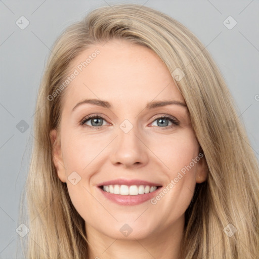 Joyful white young-adult female with long  brown hair and grey eyes