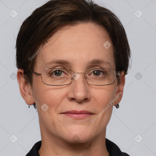 Joyful white adult female with short  brown hair and grey eyes