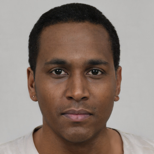 Neutral black young-adult male with short  black hair and brown eyes