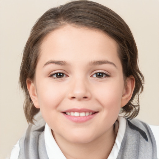 Joyful white child female with medium  brown hair and brown eyes