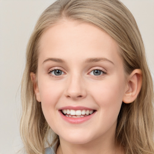 Joyful white young-adult female with long  brown hair and blue eyes