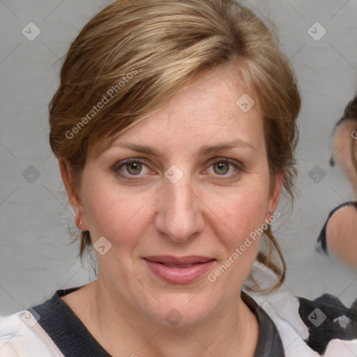 Joyful white adult female with medium  brown hair and blue eyes